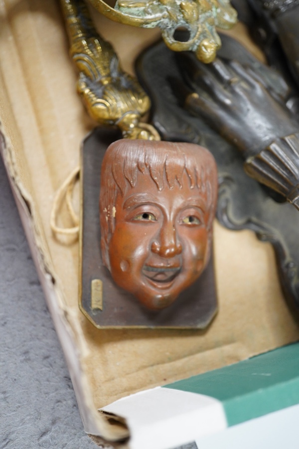 A collection of novelty hand and other desk paper clips, including a large mother of pearl shell, a pietra dura plaque and a brass pen stand, 22cm high. Condition - one poor but mostly fair to good